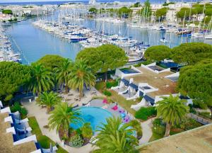 an aerial view of a marina with boats at Le Spinaker in Le Grau-du-Roi