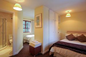 Voodi või voodid majutusasutuse Pinewood Lodge Guest House toas
