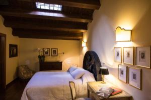 Postel nebo postele na pokoji v ubytování B&B Charme Celestino V° + 23 fotografií
