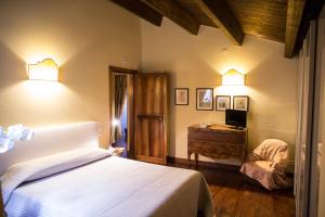 Postel nebo postele na pokoji v ubytování B&B Charme Celestino V°