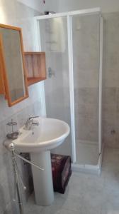 Kúpeľňa v ubytovaní White Apartment
