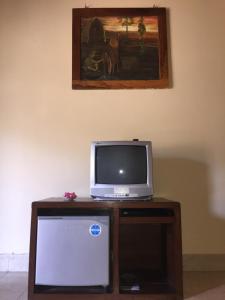 TV a/nebo společenská místnost v ubytování Rumah Saga