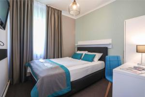 Una cama o camas en una habitación de Hotel Sokak
