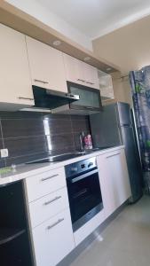 Kuchyň nebo kuchyňský kout v ubytování Apartments Lena
