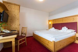 Letto o letti in una camera di all inclusive Hotel Lohmann