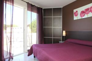 Postel nebo postele na pokoji v ubytování Hotel Saint Germain