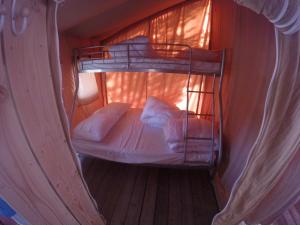 Postel nebo postele na pokoji v ubytování Camping la Simioune en Provence