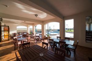 Ресторант или друго място за хранене в Pensiunea Coralia