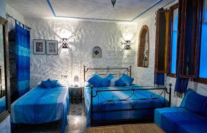 Cama o camas de una habitación en Dar Yakout