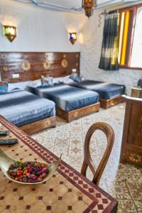 Cama o camas de una habitación en Dar Yakout