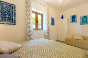 Posteľ alebo postele v izbe v ubytovaní Villa Isanda