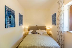 Tempat tidur dalam kamar di Villa Tranquillity XII