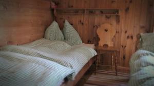 Postel nebo postele na pokoji v ubytování Sommeralmhütte