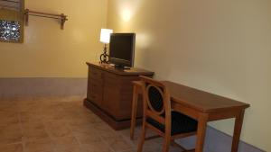 TV o dispositivi per l'intrattenimento presso Luxury Inn