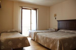 Postel nebo postele na pokoji v ubytování Hotel Rantiner + 37 fotografií