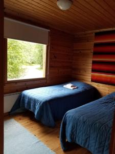 Postel nebo postele na pokoji v ubytování Salmon