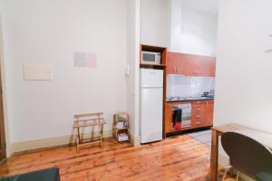 Flinders Lane Superior Studio Apartment tesisinde mutfak veya mini mutfak