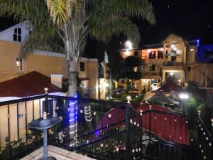 a view from a balcony of a hotel at night at Hotel Farah in Nuevo San Juan Parangaricutiro