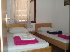 Posteľ alebo postele v izbe v ubytovaní Apartments Banoci + 37 fotografií