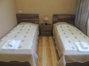 Postel nebo postele na pokoji v ubytování Guest House Chirina + 25 fotografií