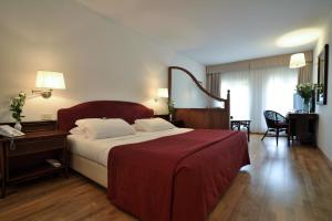 Postel nebo postele na pokoji v ubytování Hotel Hannover