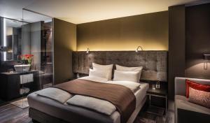 Cama ou camas em um quarto em SAKS Urban Design Hotel Frankfurt