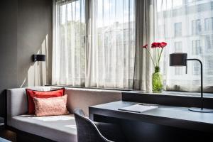 Cama ou camas em um quarto em SAKS Urban Design Hotel Frankfurt