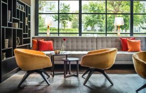 Uma área de estar em SAKS Urban Design Hotel Frankfurt