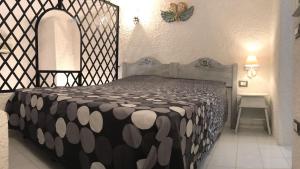 A bed or beds in a room at Il Nido 1