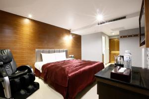 Letto o letti in una camera di Hua Xiang Motel - Arena