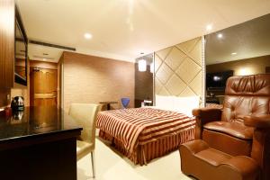 Area soggiorno di Hua Xiang Motel - Arena