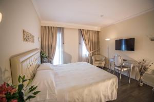 TV a/nebo společenská místnost v ubytování Hotel Patavium