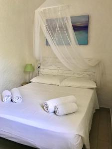 A bed or beds in a room at Boutique Art Villa Maria