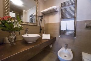 Koupelna v ubytování Hotel Patavium