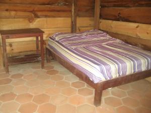 เตียงในห้องที่ Posada Brisa Marina