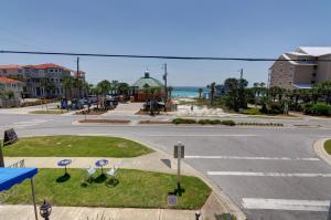an empty street in front of the ocean at Beachside Inn in Destin