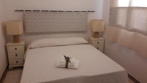 Postel nebo postele na pokoji v ubytování Camere Vacanze Acqua Chiara