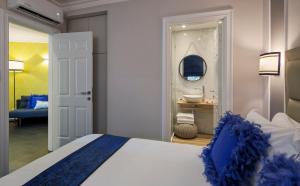 Postel nebo postele na pokoji v ubytování A23 Boutique Hotel
