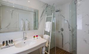 Koupelna v ubytování A23 Boutique Hotel