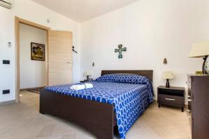Ένα ή περισσότερα κρεβάτια σε δωμάτιο στο Villa Mare Ficarazzi