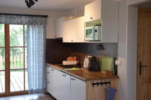Kuchyň nebo kuchyňský kout v ubytování Apartmány Kojákovice - Třeboň