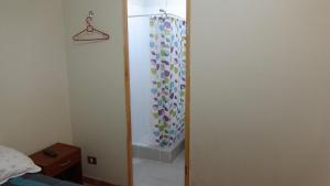 Een badkamer bij Casa Blanca Hospedaje