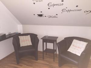 Posezení v ubytování Komfortable Apartments in der Villa Eule