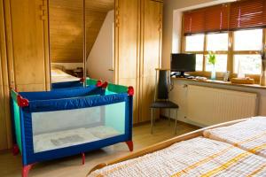 Postel nebo postele na pokoji v ubytování Komfortable Apartments in der Villa Eule