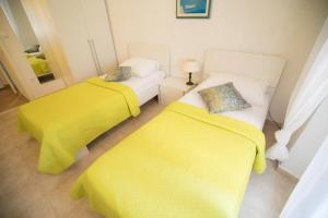Ein Bett oder Betten in einem Zimmer der Unterkunft Stella del Mare Apartment - Dubrovnik Old Town Getaway