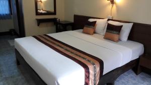 Lova arba lovos apgyvendinimo įstaigoje Lanna Thai Guesthouse