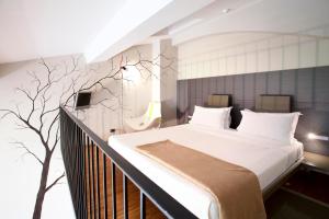 Postel nebo postele na pokoji v ubytování Alter Hotel