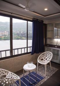 
A seating area at Lavasa Luxury Lakeview Studio
