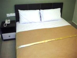 Cama o camas de una habitación en BBP Hotel