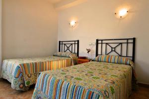 Cama o camas de una habitación en Hospedaje Facundo